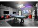 Game room with pool table, foosball, and gaming chairs at 1603 Lima Ave, Kissimmee, FL 34747