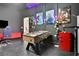 Game room with foosball table and Marvel artwork at 1603 Lima Ave, Kissimmee, FL 34747