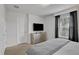 Bedroom with a comfortable bed and ample closet space at 1603 Lima Ave, Kissimmee, FL 34747