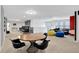 Open playroom with a dining area and home theater at 1603 Lima Ave, Kissimmee, FL 34747