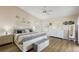 Spacious main bedroom with king-size bed and lots of natural light at 25114 Meriweather Rd, Leesburg, FL 34748