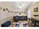 Home office with built-in workspace and a comfortable seating area at 25114 Meriweather Rd, Leesburg, FL 34748