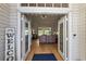 View through the front door; light hardwood floors at 25114 Meriweather Rd, Leesburg, FL 34748
