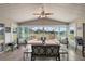 Sunroom with comfortable seating and access to patio at 25114 Meriweather Rd, Leesburg, FL 34748