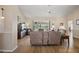 Spacious living room with hardwood floors and comfy seating at 25114 Meriweather Rd, Leesburg, FL 34748