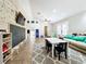 Fun playroom with chalkboard wall, built-in play area, and comfortable seating at 33413 Fairway Rd, Leesburg, FL 34788