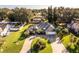 Aerial view of house, driveway and surrounding neighborhood at 33516 Overton Dr, Leesburg, FL 34788