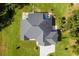 Overhead view of house showing roofline, backyard and driveway at 3927 Oak Pointe Dr, Lady Lake, FL 32159