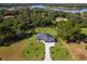 Single-Gathering home with a two-car garage and large lot next to a lake at 3927 Oak Pointe Dr, Lady Lake, FL 32159