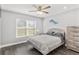 Guest bedroom with ceiling fan and plenty of natural light at 3927 Oak Pointe Dr, Lady Lake, FL 32159