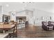 Open concept dining area with a view of the kitchen and living room at 3927 Oak Pointe Dr, Lady Lake, FL 32159