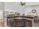 Large kitchen island with a sink and dishwasher, perfect for entertaining at 3927 Oak Pointe Dr, Lady Lake, FL 32159