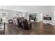 Spacious living room with hardwood floors and fireplace at 3927 Oak Pointe Dr, Lady Lake, FL 32159