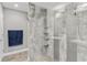 Walk-in shower with glass enclosure and stylish tile work at 3927 Oak Pointe Dr, Lady Lake, FL 32159