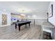 Game room with a pool table and a view of the hallway at 405 Amola Way, Howey In The Hills, FL 34737