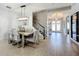Modern dining room with a large table and stylish chairs at 405 Amola Way, Howey In The Hills, FL 34737