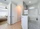 Bathroom features a walk-in shower, toilet, and linen closet at 405 Amola Way, Howey In The Hills, FL 34737