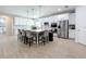 Bright kitchen featuring an expansive island and white cabinets at 405 Amola Way, Howey In The Hills, FL 34737