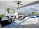 Spacious covered patio overlooking the pool and backyard at 405 Amola Way, Howey In The Hills, FL 34737