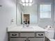 Clean bathroom with vanity, sink, and shower at 405 Amola Way, Howey In The Hills, FL 34737