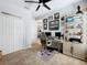 Spacious home office with a desk, chair, and ample storage at 405 Amola Way, Howey In The Hills, FL 34737