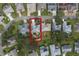 Aerial view showing home's location in a residential neighborhood at 4803 Sawgrass Lake Cir, Leesburg, FL 34748
