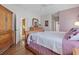 Main bedroom with ensuite bathroom access at 4803 Sawgrass Lake Cir, Leesburg, FL 34748