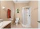 Clean bathroom with a shower stall and a toilet at 9442 Cr 674, Bushnell, FL 33513