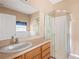 Updated bathroom with vanity and shower at 9442 Cr 674, Bushnell, FL 33513