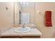 Bathroom featuring a vanity and a shower at 9442 Cr 674, Bushnell, FL 33513