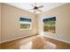 Spacious bedroom with large windows and wood floors at 9442 Cr 674, Bushnell, FL 33513