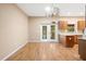 Bright dining room with hardwood floors at 9442 Cr 674, Bushnell, FL 33513