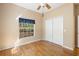 Charming bedroom with wood floors and ample closet space at 9442 Cr 674, Bushnell, FL 33513