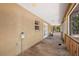 Screened porch with wooden deck and access to backyard at 9442 Cr 674, Bushnell, FL 33513