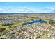Aerial view of the house and surrounding community at 1429 Bluebeard Ct, The Villages, FL 32163
