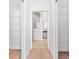 Walk-in closet with custom shelving and ample storage space at 1429 Bluebeard Ct, The Villages, FL 32163