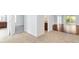Bright hallway with tile floors and access to bedrooms and living areas at 1429 Bluebeard Ct, The Villages, FL 32163