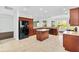 Modern kitchen with a large island and ample cabinet space at 1429 Bluebeard Ct, The Villages, FL 32163