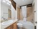 Clean bathroom, featuring a bathtub, toilet and sink at 397 Simpson St, The Villages, FL 32162