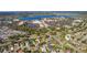 Wide aerial view of community, near a lake and shopping at 1006 Sayle St, The Villages, FL 32162