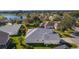 Rear view of the house showing the roofline and surrounding neighborhood at 1006 Sayle St, The Villages, FL 32162