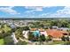 Resort-style community pool and clubhouse, aerial view at 10286 Julia Isles Ave, Oxford, FL 34484