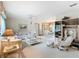 Living room with light-colored furniture and carpeting at 11036 Cr 229, Oxford, FL 34484