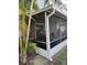 Screened porch with a view of the backyard, and space for relaxing at 12144 Bruceton Way # 101, Orlando, FL 32828