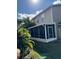 Screened-in porch with ample space and view of the backyard at 12144 Bruceton Way # 101, Orlando, FL 32828