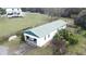 Aerial view of property showing house, barn, and expansive land at 13131 Mountain Vw, Clermont, FL 34715