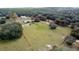 Aerial view of property with home and outbuildings at 13131 Mountain Vw, Clermont, FL 34715