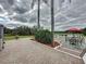 Brick patio leading to a deck with outdoor seating at 13131 Mountain Vw, Clermont, FL 34715