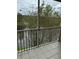 Screened balcony overlooking a tranquil lake view at 13584 Turtle Marsh Loop # 132, Orlando, FL 32837