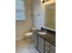 Bathroom with granite countertop vanity and tiled floor at 13584 Turtle Marsh Loop # 132, Orlando, FL 32837